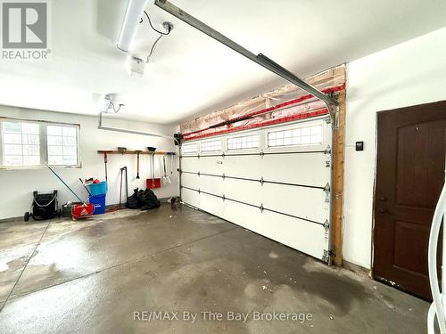 Side Door - 111 Balm Beach Road E, Tiny, ON - Indoor Photo Showing Garage