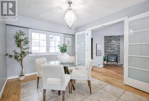 111 Balm Beach Road E, Tiny, ON - Indoor Photo Showing Dining Room With Fireplace