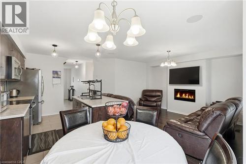 45 Kelso Drive, Caledonia, ON - Indoor Photo Showing Dining Room With Fireplace