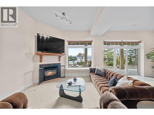 3676 Mcbride Road, Blind Bay, BC - Indoor Photo Showing Living Room With Fireplace
