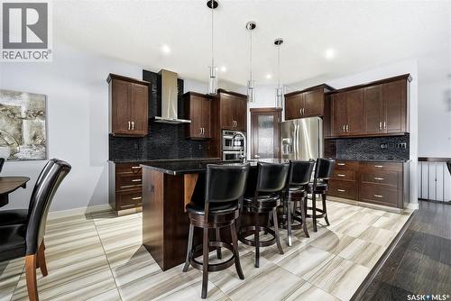 3921 Red Lily Bay, Regina, SK - Indoor Photo Showing Kitchen With Upgraded Kitchen
