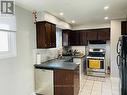 9 Terra Cotta Crescent E, Brampton, ON  - Indoor Photo Showing Kitchen With Double Sink 
