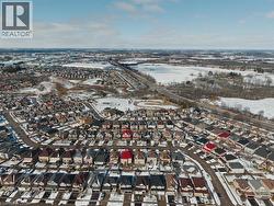 Snowy aerial view featuring a residential view - 
