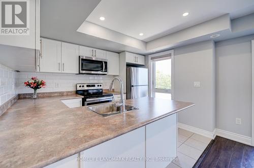 2213 - 10 Westmeath Lane N, Markham, ON - Indoor Photo Showing Kitchen With Double Sink