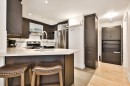 Kitchen - 305-375 Boul. Décarie, Montréal (Saint-Laurent), QC  - Indoor Photo Showing Kitchen With Stainless Steel Kitchen With Upgraded Kitchen 