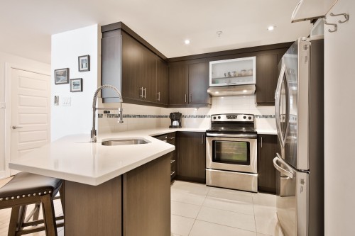 Kitchen - 305-375 Boul. Décarie, Montréal (Saint-Laurent), QC - Indoor Photo Showing Kitchen With Stainless Steel Kitchen