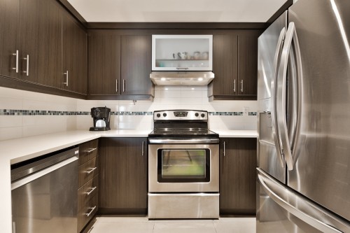 Kitchen - 305-375 Boul. Décarie, Montréal (Saint-Laurent), QC - Indoor Photo Showing Kitchen With Stainless Steel Kitchen