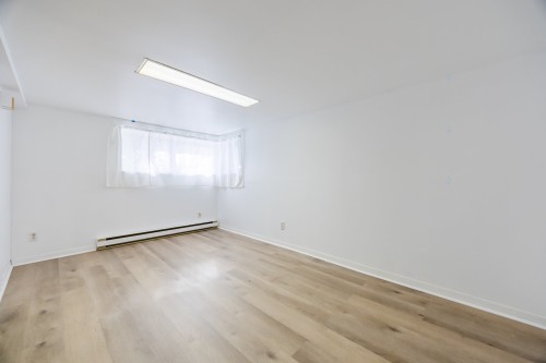 Salon - 9153 Av. Millen, Montréal (Ahuntsic-Cartierville), QC - Indoor Photo Showing Other Room