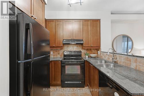 Ph20 - 16 Dallimore Circle, Toronto, ON - Indoor Photo Showing Kitchen With Double Sink