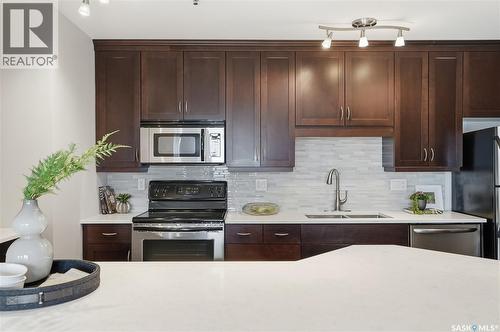 702 902 Spadina Crescent E, Saskatoon, SK - Indoor Photo Showing Kitchen With Stainless Steel Kitchen