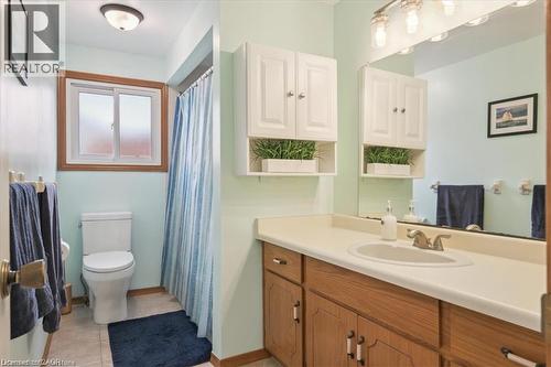 Full bathroom with vanity, a shower with shower curtain, and light tile patterned floors - 47 Claycroft Crescent Unit# Upper, Kitchener, ON - Indoor Photo Showing Bathroom