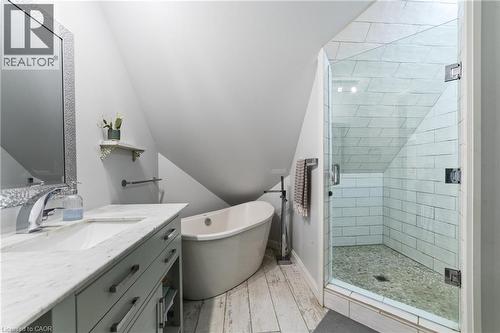 Guest house full bathroom with walk-in shower with glass door, soaker tub, vanity and toilet, lofted ceilings - 515 Hamilton Drive, Ancaster, ON - Indoor Photo Showing Bathroom