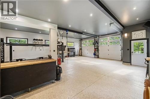 Detached garage featuring built in cabinetry, recessed lighting - 515 Hamilton Drive, Ancaster, ON - Indoor Photo Showing Garage