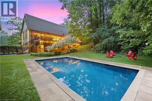 Virtually staged property is roughed in for a pool and a hot water pool boiler as well as electrical for pool house - 515 Hamilton Drive, Ancaster, ON - Outdoor With In Ground Pool With Deck Patio Veranda With Backyard