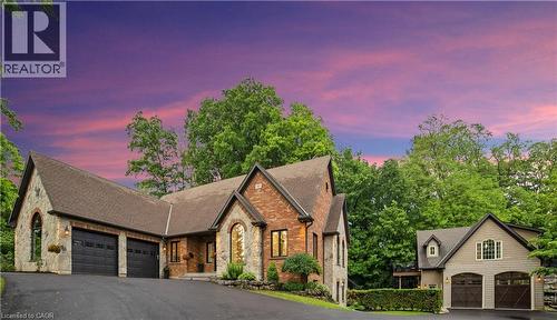 515 Hamilton Drive featuring an in-law suite and additional detached garage that adds 800+ sq ft of modern living space, versatile home for executives, small business owners or multi-generational fami - 515 Hamilton Drive, Ancaster, ON - Outdoor With Deck Patio Veranda