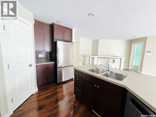 29 500 Battleford Trail, Swift Current, SK - Indoor Photo Showing Kitchen With Double Sink