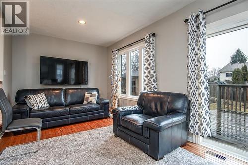 Living room featuring hardwood / wood-style floors and recessed lighting - 236 Dartmoor Crescent, Waterloo, ON - Indoor Photo Showing Living Room