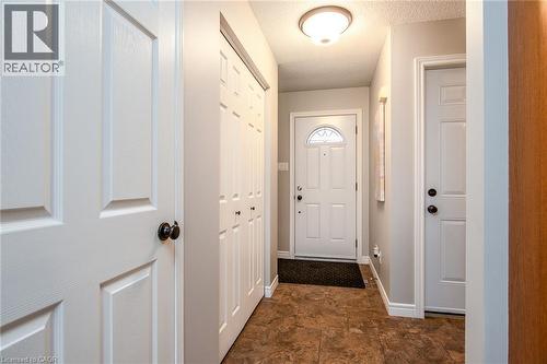Entryway with a textured ceiling and stone finish floors - 236 Dartmoor Crescent, Waterloo, ON - Indoor Photo Showing Other Room