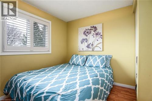 Bedroom with baseboards and wood finished floors - 236 Dartmoor Crescent, Waterloo, ON - Indoor Photo Showing Bedroom