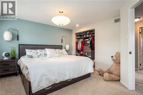 Carpeted bedroom with a closet and baseboards - 236 Dartmoor Crescent, Waterloo, ON - Indoor Photo Showing Bedroom
