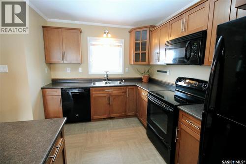 308 115 Dalgleish Link, Saskatoon, SK - Indoor Photo Showing Kitchen With Double Sink