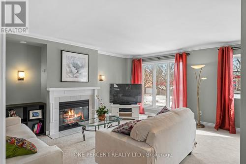 30 Maplehurst Avenue, Ottawa, ON - Indoor Photo Showing Living Room With Fireplace