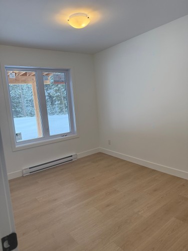 Chambre à coucher - 559A Mtée Gagnon, Sainte-Marguerite-Du-Lac-Masson, QC - Indoor Photo Showing Other Room