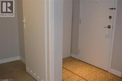 Hallway featuring baseboards - 