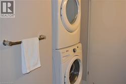 Laundry area with stacked washer / drying machine - 