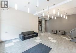 Building lobby featuring beamed ceiling - 