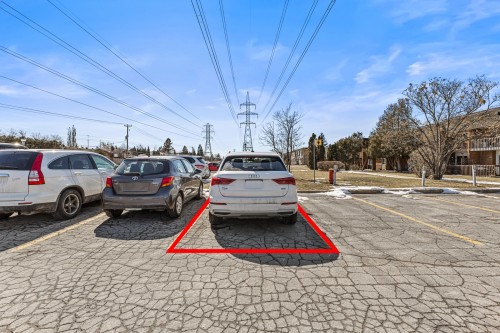 Stationnement - 104-103 Rue Angora, Dollard-Des-Ormeaux, QC - Outdoor