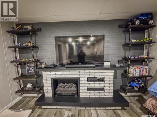 210 Wells Avenue E, Langenburg, SK - Indoor With Fireplace