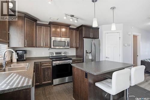 215 Wyant Lane, Saskatoon, SK - Indoor Photo Showing Kitchen With Double Sink