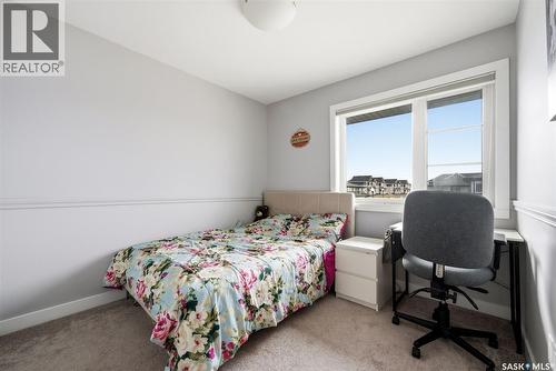 12 5301 Beacon Drive, Regina, SK - Indoor Photo Showing Bedroom