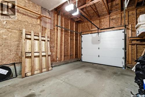 12 5301 Beacon Drive, Regina, SK - Indoor Photo Showing Garage