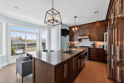 Cuisine - 10805 Rue André-Mathieu, Mirabel, QC - Indoor Photo Showing Kitchen With Upgraded Kitchen