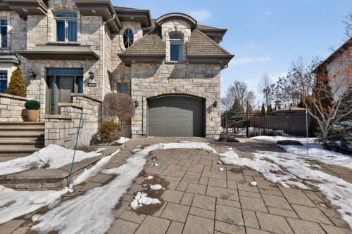 Garage - 10805 Rue André-Mathieu, Mirabel, QC - Outdoor With Facade