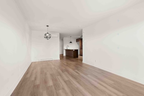 Living Room - 202-645 Rue René-Lecavalier, Terrebonne (Terrebonne), QC - Indoor Photo Showing Other Room