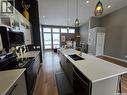 9 Carl Drive, Meadow Lake, SK  - Indoor Photo Showing Kitchen With Double Sink With Upgraded Kitchen 