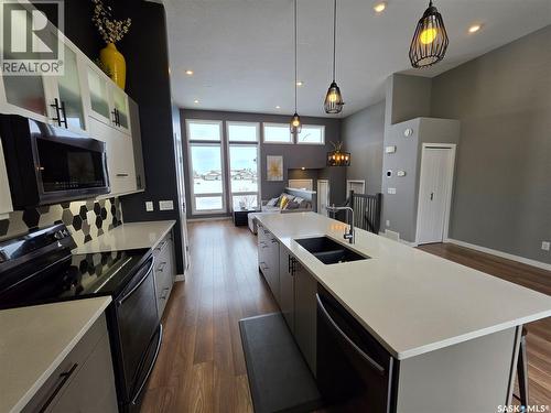 9 Carl Drive, Meadow Lake, SK - Indoor Photo Showing Kitchen With Double Sink With Upgraded Kitchen