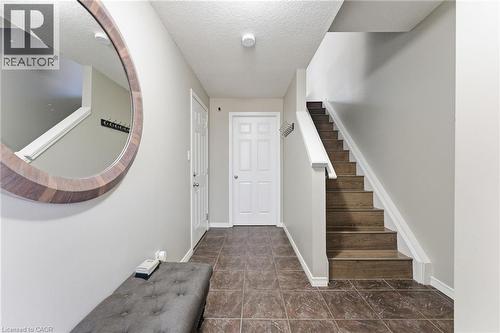 Entrance foyer with stairs and a textured ceiling - 208 Templewood Drive, Kitchener, ON - Indoor Photo Showing Other Room