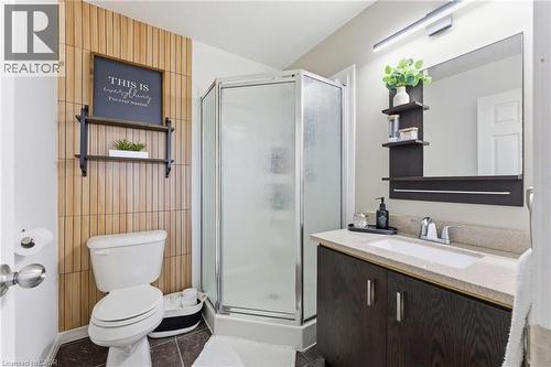 Full bath featuring vanity, a stall shower, and dark tile patterned floors - 208 Templewood Drive, Kitchener, ON - Indoor Photo Showing Bathroom