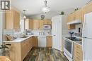 1002 Pezer Crescent, Saskatoon, SK  - Indoor Photo Showing Kitchen With Double Sink 