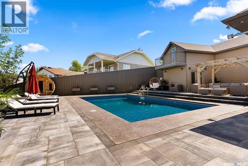 15 Meadow Bay, Lumsden, SK - Outdoor With In Ground Pool With Deck Patio Veranda