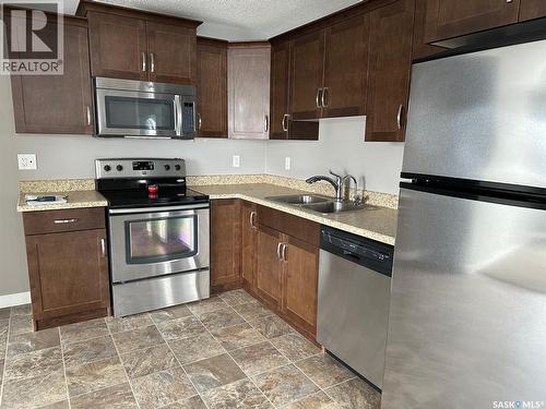 6 416 Main Street, Bienfait, SK - Indoor Photo Showing Kitchen With Double Sink