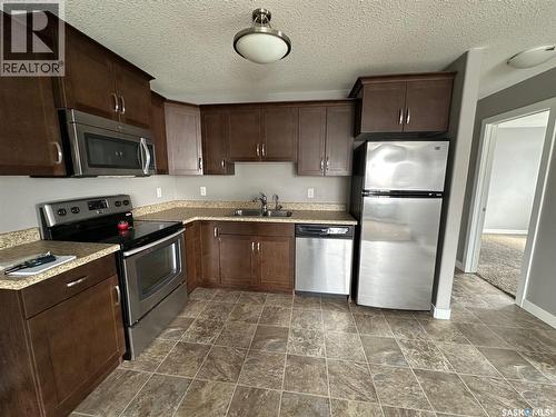 6 416 Main Street, Bienfait, SK - Indoor Photo Showing Kitchen With Double Sink