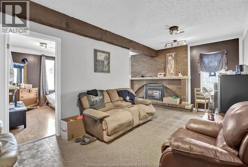 564 Wallace, Windsor, ON - Indoor Photo Showing Living Room With Fireplace