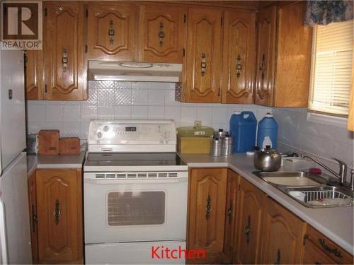 319 Main Road, Come By Chance, NL - Indoor Photo Showing Kitchen With Double Sink