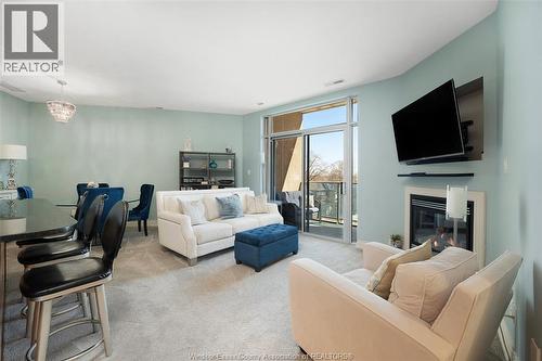 1225 Riverside Unit# 409, Windsor, ON - Indoor Photo Showing Living Room With Fireplace