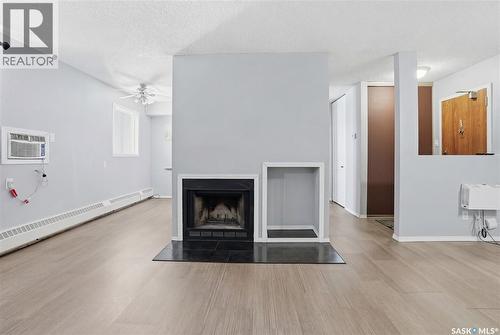 206 31 Rodenbush Drive, Regina, SK - Indoor With Fireplace